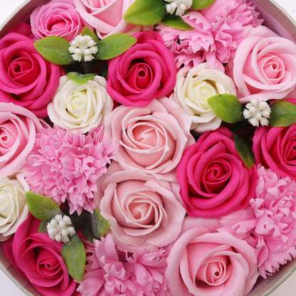 Close up of scented soap pink and white flowers petals in a circular arrangement in luxury gift box packaging - Ancient Wisdom