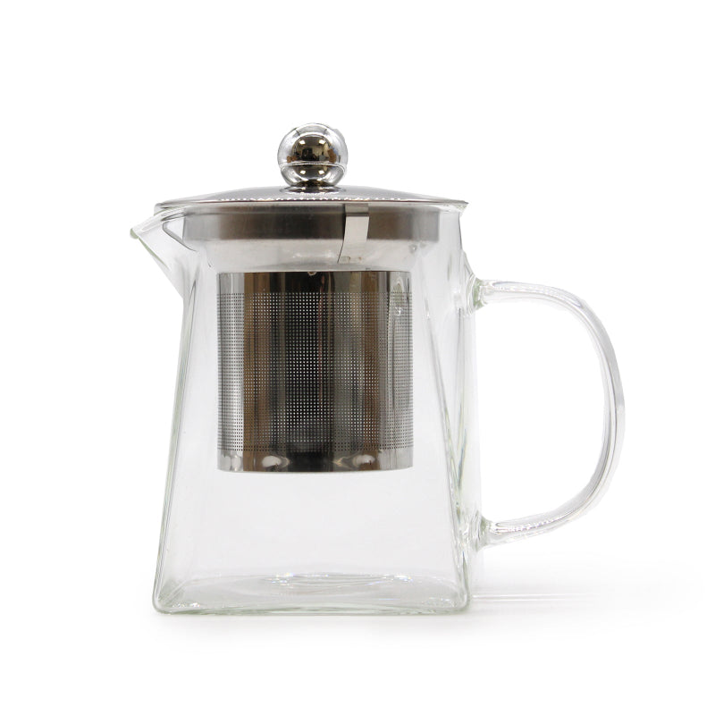 Clear glass teapot with metal lid and handle on a white background - Kraas