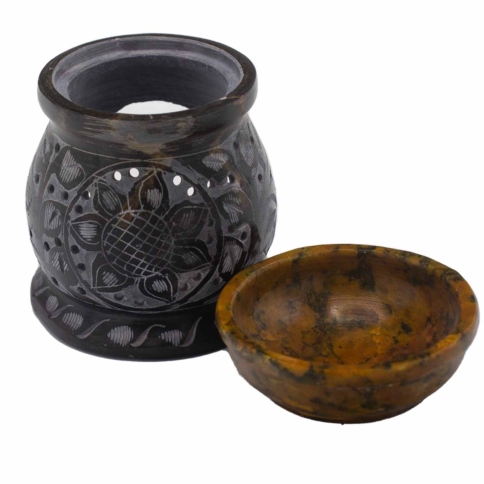 Black ceramic oil burner with Mandala Flower design patterns next to a wooden bowl for oil - Ancient Wisdom