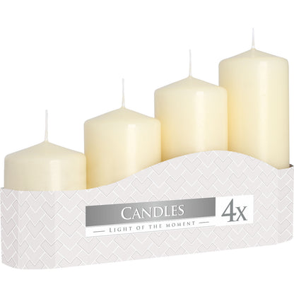 Set of four white candles in a box with 'Candles Light of the Moment' label for home décor and table styling - Kraas