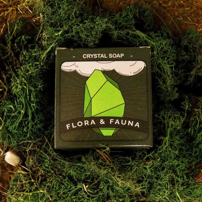 Crystal soap packaging with 'Flora & Fauna' branding on a green leafy background - Ancient Wisdom