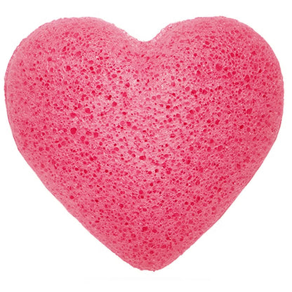 Pink heart shaped konjac sponge on a white background - Kraas