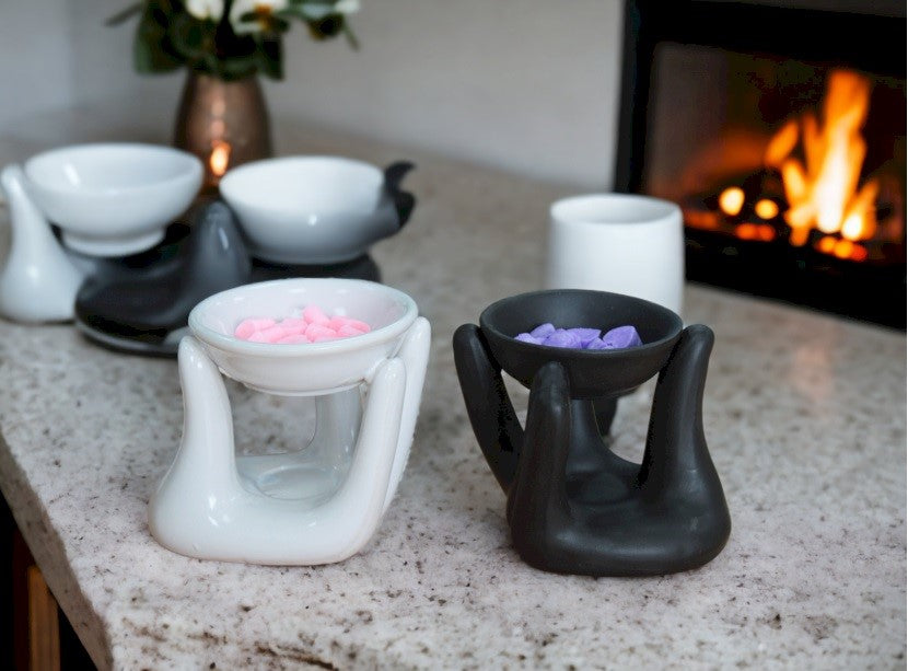 main product page image of unique ceramic oil burners showing wax in burners - Kraas